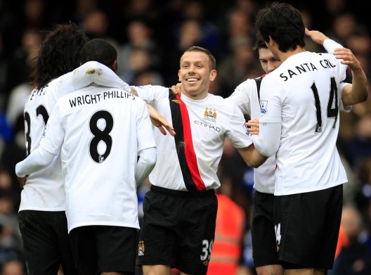 刘伟国：捧起中甲冠军奖杯很激动，明年力争在中超站稳脚跟（刘伟国：中甲夺冠令人振奋，明年力求在中超站稳脚跟）